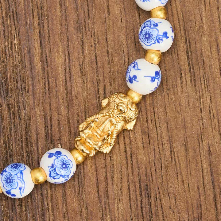 Buddha Stones Pulsera de porcelana blanca PiXiu con cuentas florales azules de buena fortuna - image 4