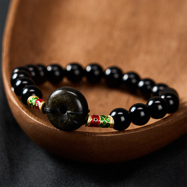 Buddha Stones Hebilla de la paz de obsidiana dorada brillante, pulsera de cuentas redondas de obsidiana negra con forma de pez koi para protección - image 2