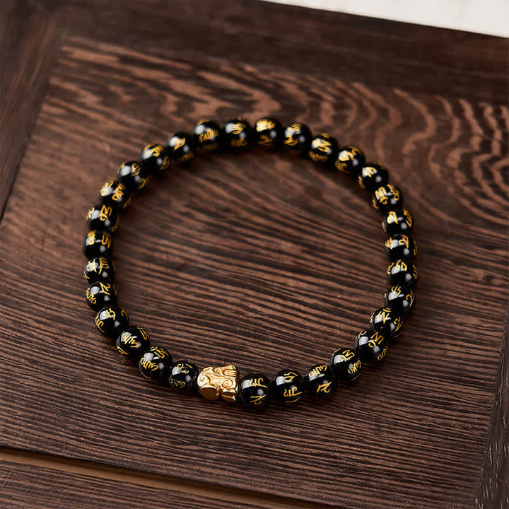Buddha Stones Pulsera de aleación con cuentas Om Mani Padme Hum de ónix negro y fuerza Pi Xiu - image 1