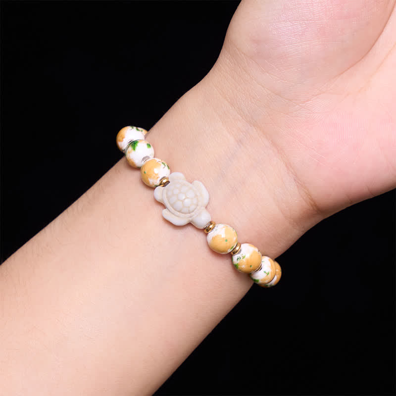 Buddha Stones Pulsera de la riqueza con diseño de tortuga y turquesa blanca natural - image 4