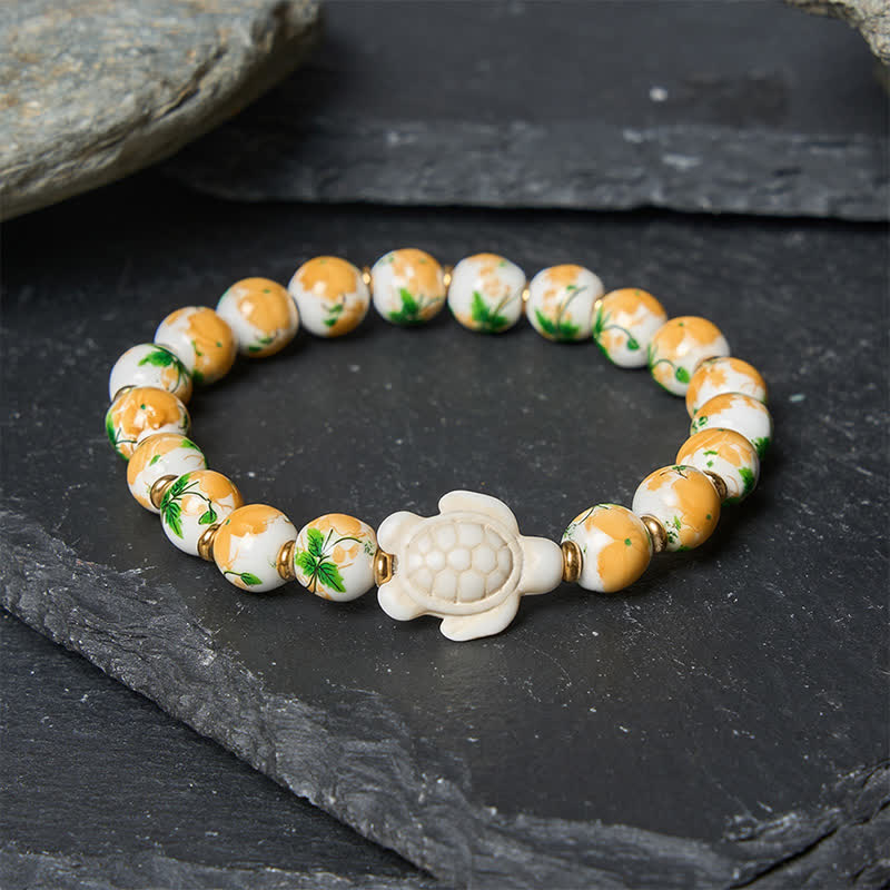 Buddha Stones Pulsera de la riqueza con diseño de tortuga y turquesa blanca natural - image 2