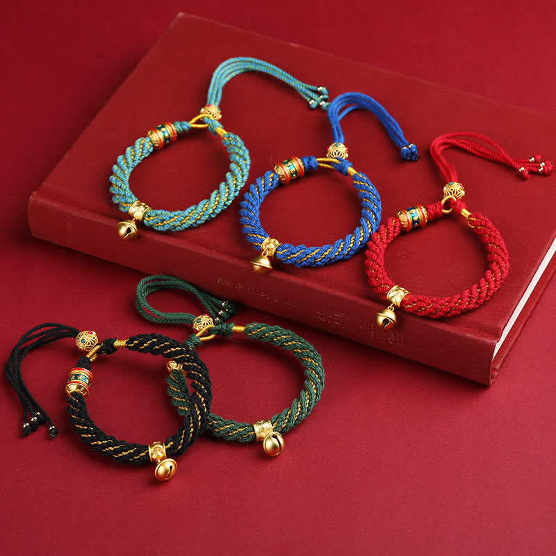 Buddha Stones Pulsera de cuerda multicolor con dije de campana de sabiduría Om Mani Padme Hum tibetana tejida a mano - image 1