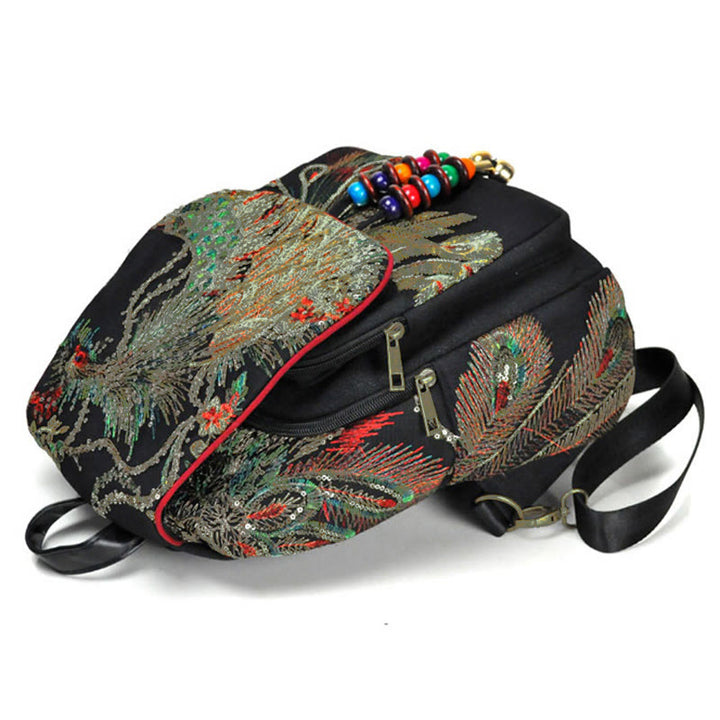 Mochila con borlas de lona con bordado de pavo real - image 3