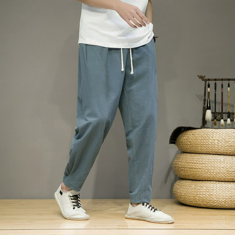 Buddha Stones Pantalones cortos minimalistas informales de primavera/verano con cordón ajustable, color liso, corte ajustado y bolsillos para hombre. - image 1