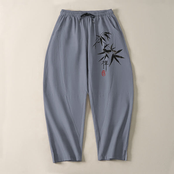 Buddha Stones Pantalones de hombre de algodón puro con estampado de hojas de bambú estilo zen, cordón ajustable y corte cónico, con bolsillos. - image 2