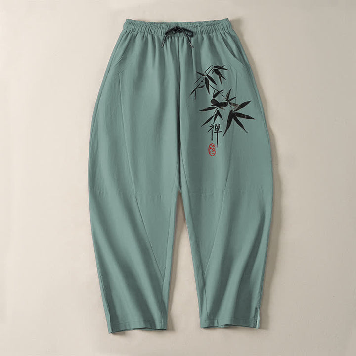 Buddha Stones Pantalones de hombre de algodón puro con estampado de hojas de bambú estilo zen, cordón ajustable y corte cónico, con bolsillos. - image 9