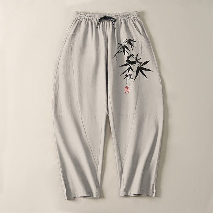 Buddha Stones Pantalones de hombre de algodón puro con estampado de hojas de bambú estilo zen, cordón ajustable y corte cónico, con bolsillos. - image 13