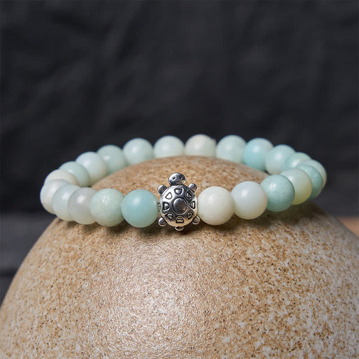 Buddha Stones Pulsera de cuentas redondas de amazonita y cobre con forma de tortuga, pulida a mano. - image 2