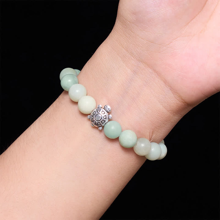 Buddha Stones Pulsera de cuentas redondas de amazonita y cobre con forma de tortuga, pulida a mano. - image 4