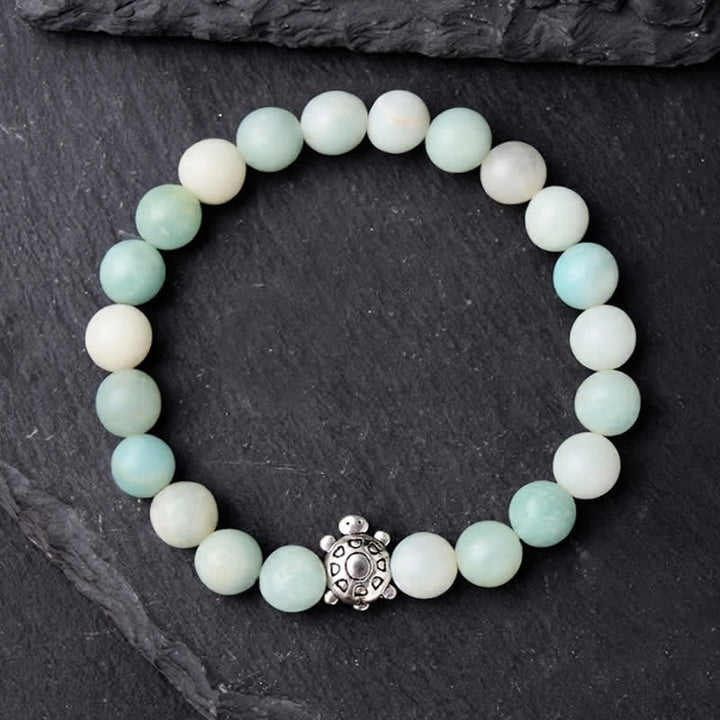 Buddha Stones Pulsera de cuentas redondas de amazonita y cobre con forma de tortuga, pulida a mano. - image 3