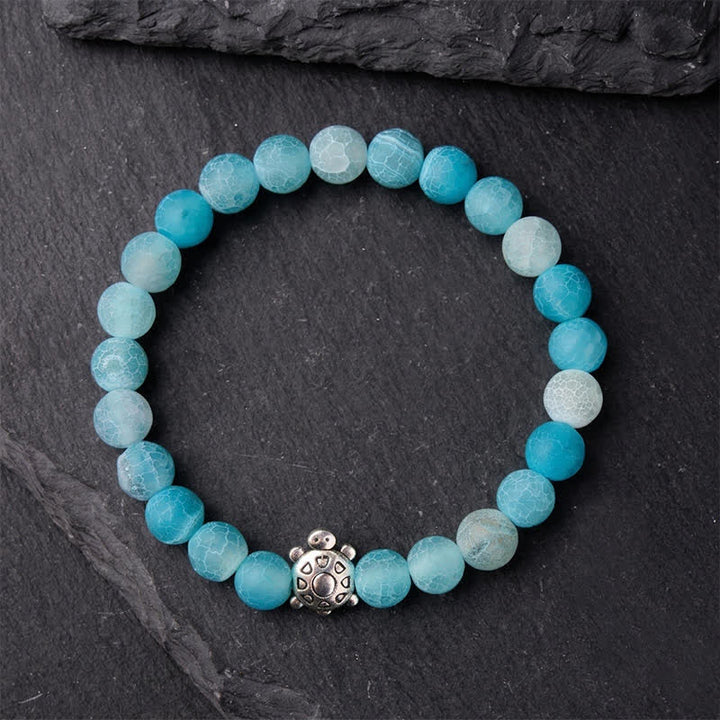 Buddha Stones Pulsera de cuentas de ágata azul craquelada con diseño de tortuga y diseño de tortuga. - image 1