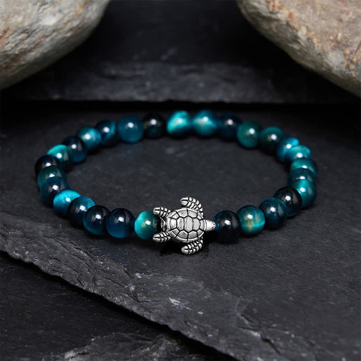 Buddha Stones Pulsera poderosa de tortuga de cobre con ojo de tigre azul - Ojo de tigre azul de 6 mm (circunferencia de la muñeca: 14-15 cm) - image 0