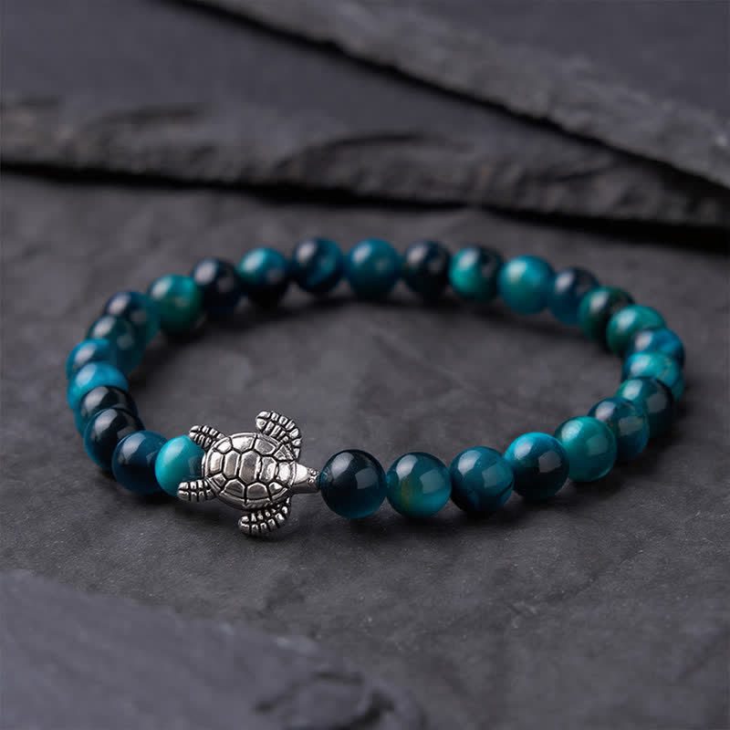Buddha Stones Pulsera poderosa de tortuga de cobre con ojo de tigre azul - image 1