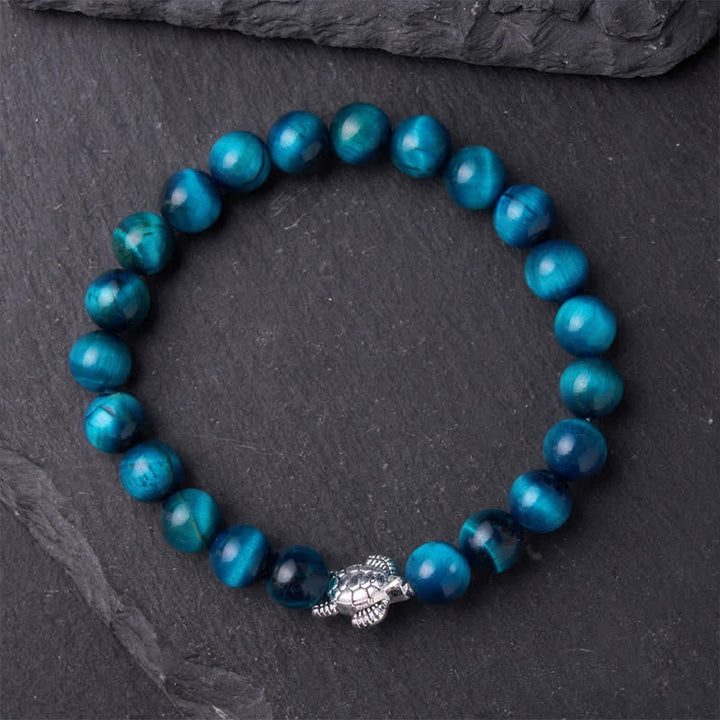 Buddha Stones Pulsera poderosa de tortuga de cobre con ojo de tigre azul - image 11