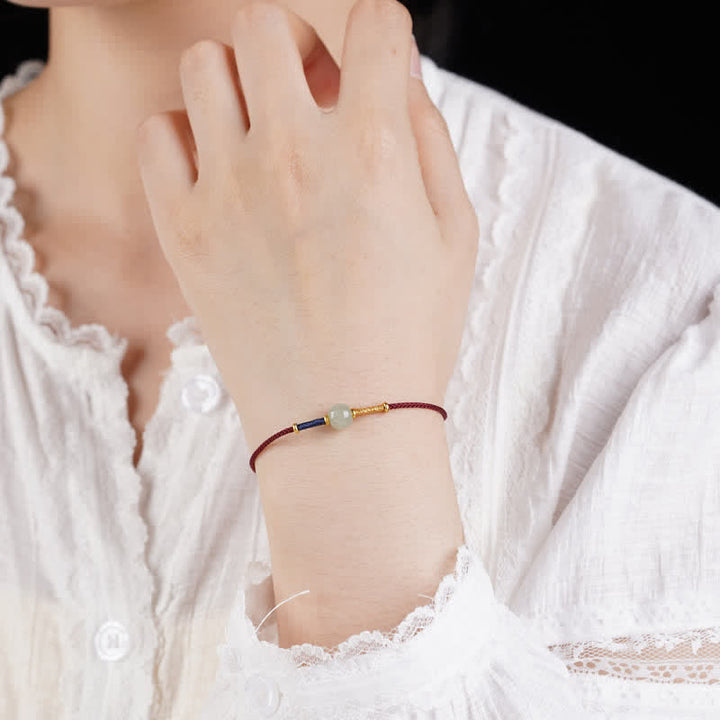 Buddha Stones Pulsera tobillera ajustable de cuentas redondas de jade con hilo rojo y diseño de armonía. - image 13