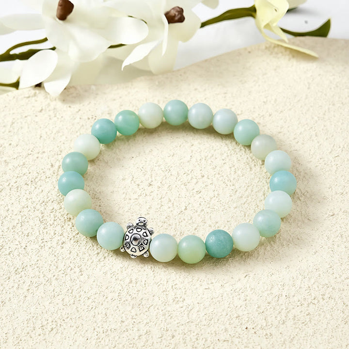 Buddha Stones Pulsera de cuentas redondas de amazonita y cobre con forma de tortuga, pulida a mano. - Amazonita (Circunferencia de la muñeca: 5,9–6,3 pulgadas / 15–16 cm) - image 0