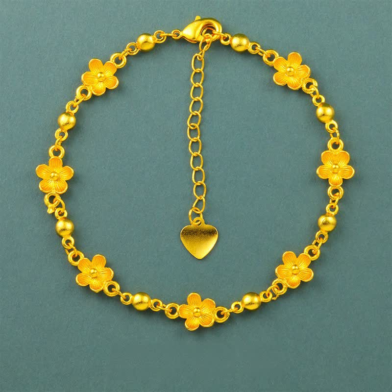 Buddha Stones Pulsera con dije de corazón de latón chapado en oro y diseño floral de flor de durazno - Flor de durazno (circunferencia de la muñeca: 6,3-7,1 pulgadas / 16-18 cm) - image 0