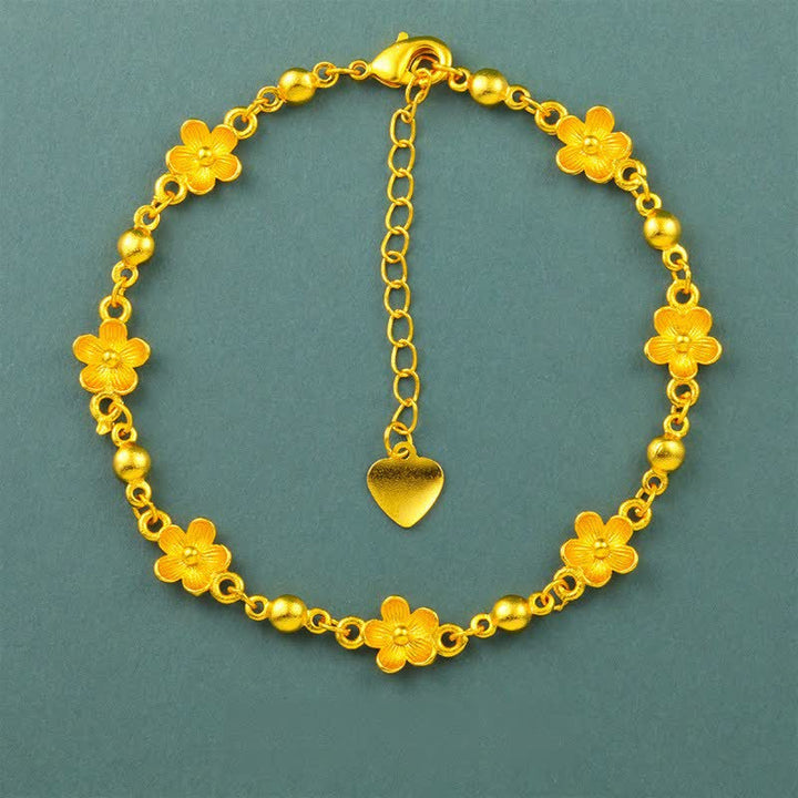 Buddha Stones Pulsera con dije de corazón de latón chapado en oro y diseño floral de flor de durazno - Flor de durazno (circunferencia de la muñeca: 6,3-7,1 pulgadas / 16-18 cm) - image 0