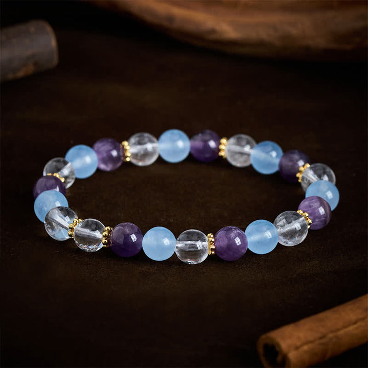 Buddha Stones Pulsera protectora de cuentas de cuarzo transparente, amatista y calcedonia azul - image 1