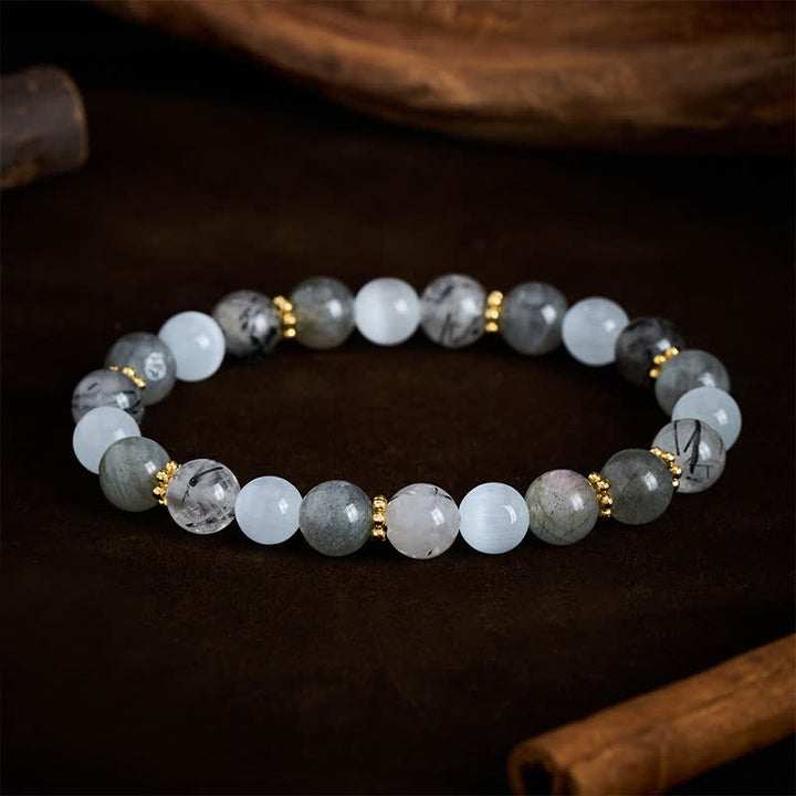 Buddha Stones Pulsera de la abundancia con cuentas de cuarzo rutilado negro, ojo de gato blanco y piedra lunar. - image 2