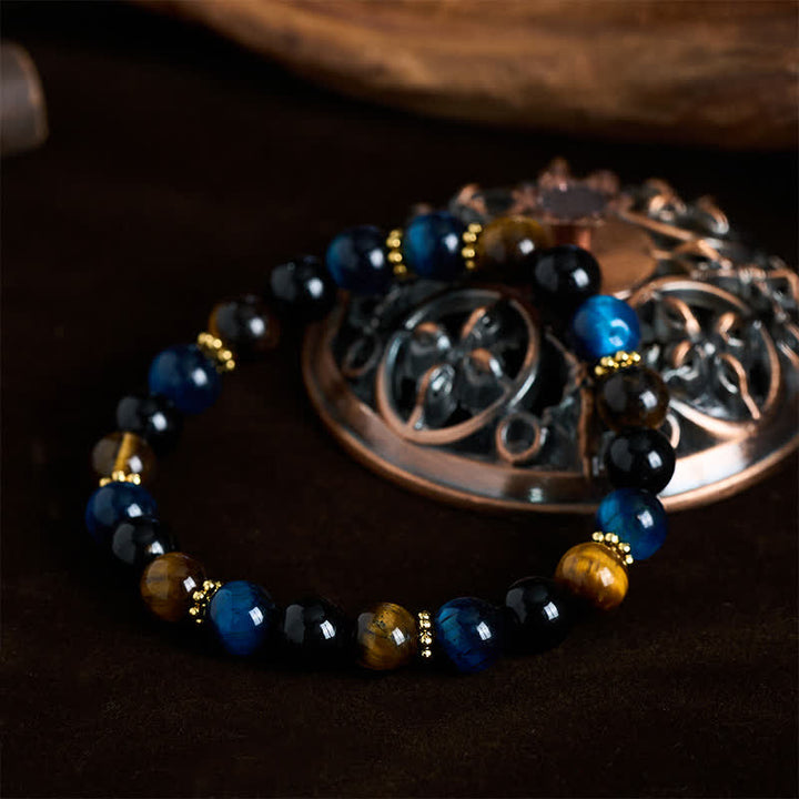Buddha Stones Pulsera de cuentas de obsidiana azul y negra con ojo de tigre. - image 1