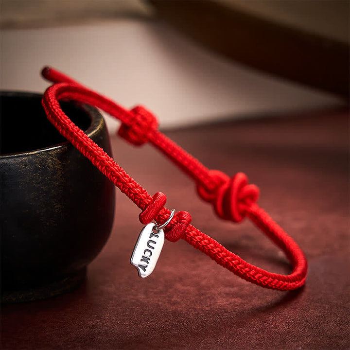 Buddha Stones Pulsera ajustable con dije de la suerte, hecha a mano con hilo trenzado rojo. - image 1
