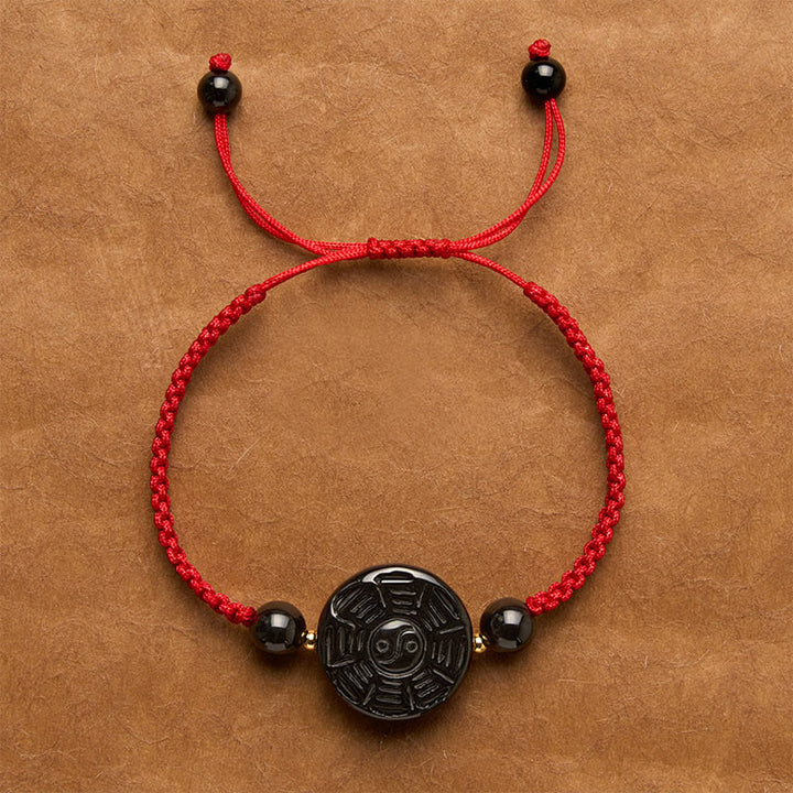 Buddha Stones Pulsera redonda de bendición Bagua de obsidiana negra con hilo rojo - Cordón rojo (circunferencia de la muñeca: 15-17 cm) - Aprox. 22 × 9 mm - image 0