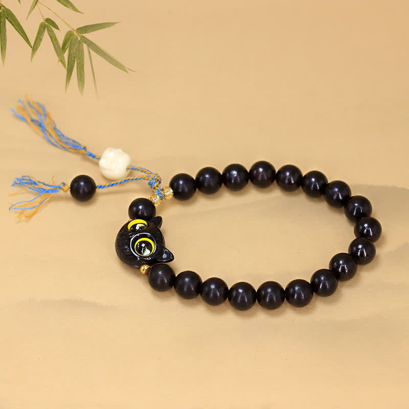 Buddha Stones Pulsera redonda trenzada con dije de gato de madera de ébano - image 3