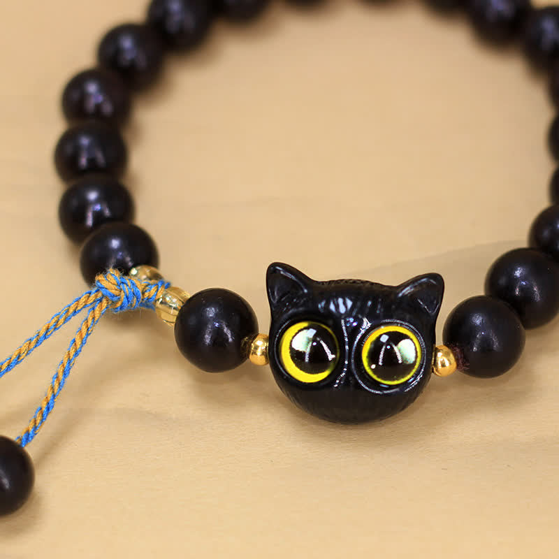 Buddha Stones Pulsera redonda trenzada con dije de gato de madera de ébano - image 4