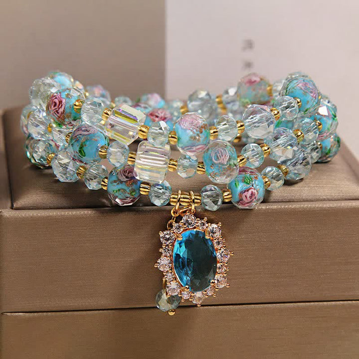 Buddha Stones Pulsera de triple vuelta con dije ovalado floral de cuentas de vidrio Blue Liuli y dije de cristal azul. - image 8