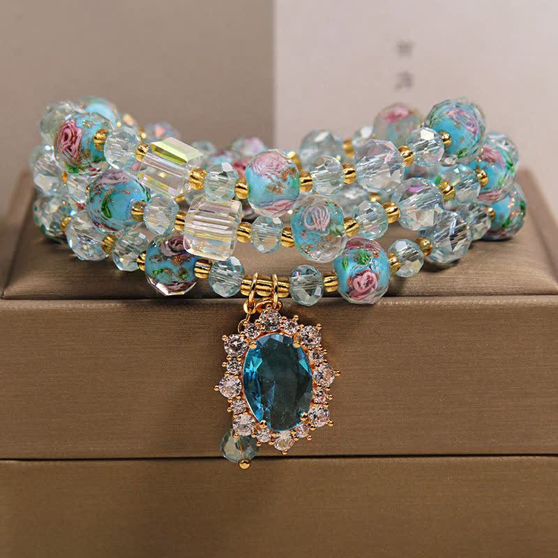 Buddha Stones Pulsera de triple vuelta con dije ovalado floral de cuentas de vidrio Blue Liuli y dije de cristal azul. - 5,9-6,3 pulgadas / 15-16 cm - image 0