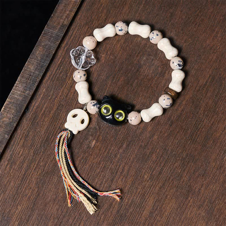 Buddha Stones Pulsera con diseño de calavera de gato y hueso, símbolo de valentía. - Calavera (Cambio ♥ Coraje) - image 0