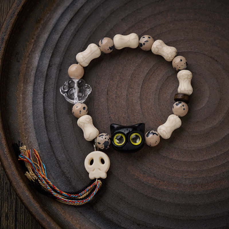 Buddha Stones Pulsera con diseño de calavera de gato y hueso, símbolo de valentía. - image 1