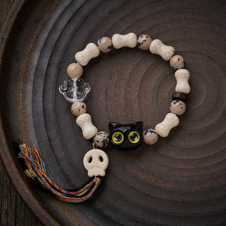 Buddha Stones Pulsera con diseño de calavera de gato y hueso, símbolo de valentía. - image 1