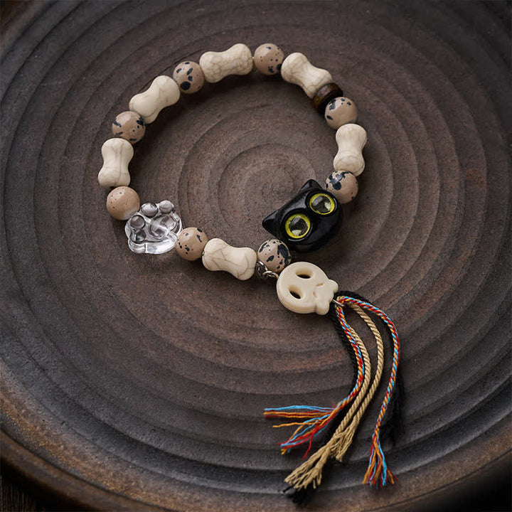Buddha Stones Pulsera con diseño de calavera de gato y hueso, símbolo de valentía. - image 2