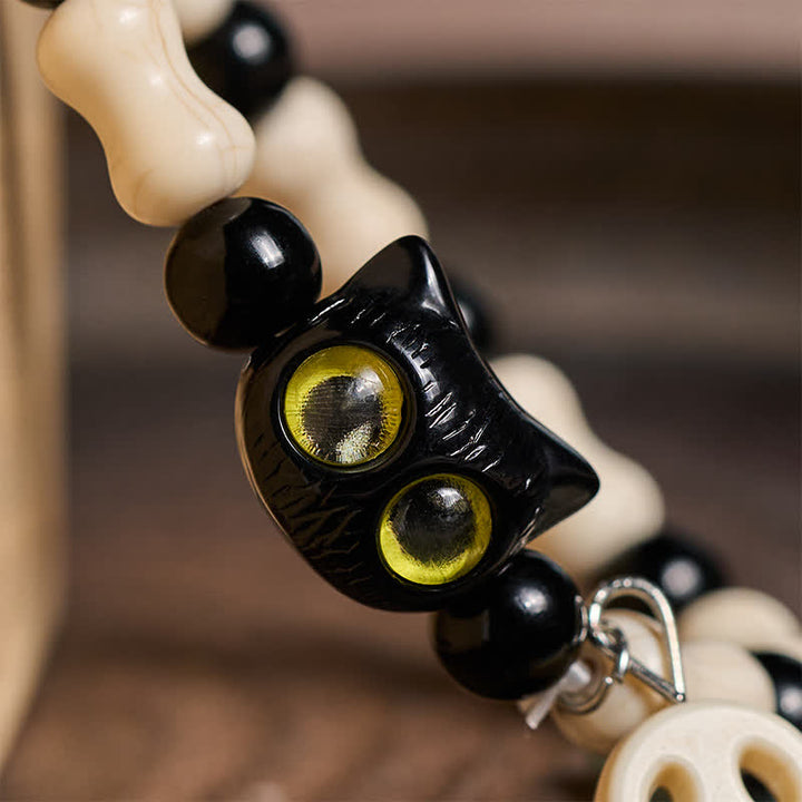 Buddha Stones Pulsera de fuerza con cuentas de calavera y gato negro - image 12