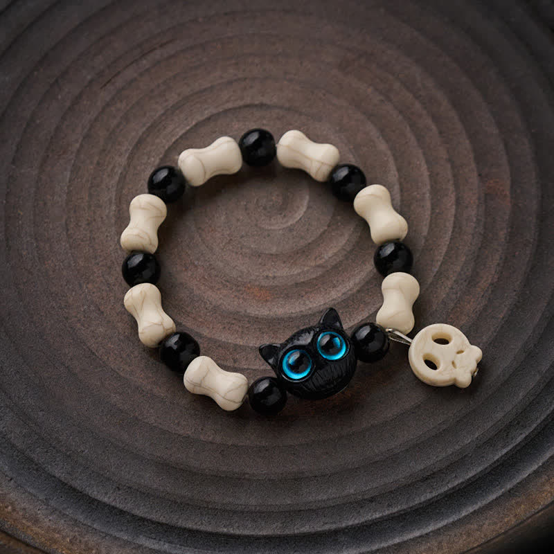Buddha Stones Pulsera de fuerza con cuentas de calavera y gato negro - image 1