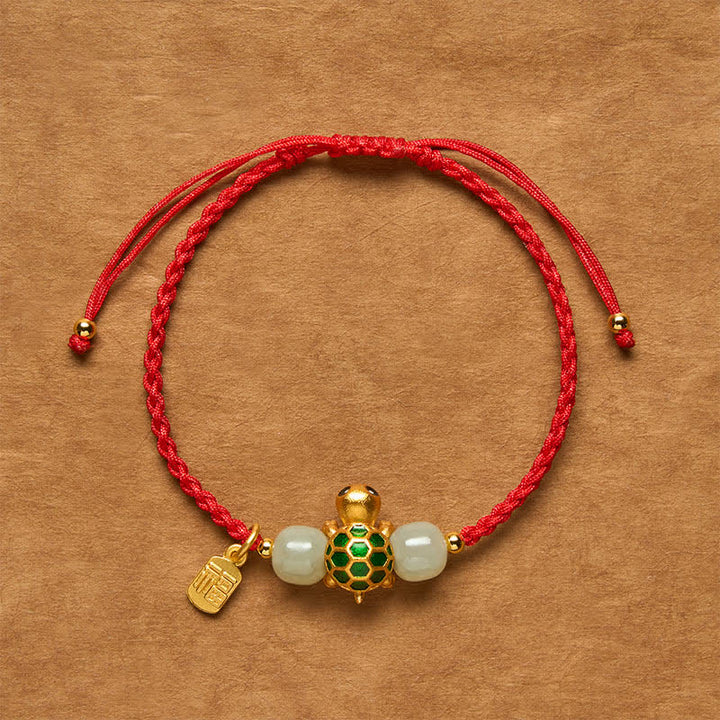 Buddha Stones Pulsera de la prosperidad con diseño de tortuga de cobre y carácter Fu, de jade rojo Hetian. - Pulsera de hilo rojo con forma de tortuga - 5,5–7,1 pulgadas/14–18 cm - image 0