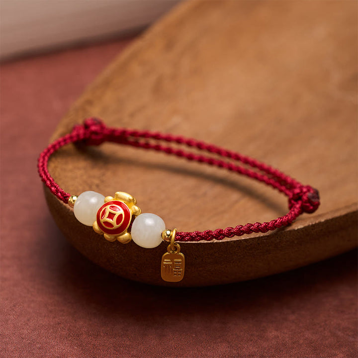 Buddha Stones Pulsera de fuerza tejida a mano con hilo rojo de tortuga - image 1