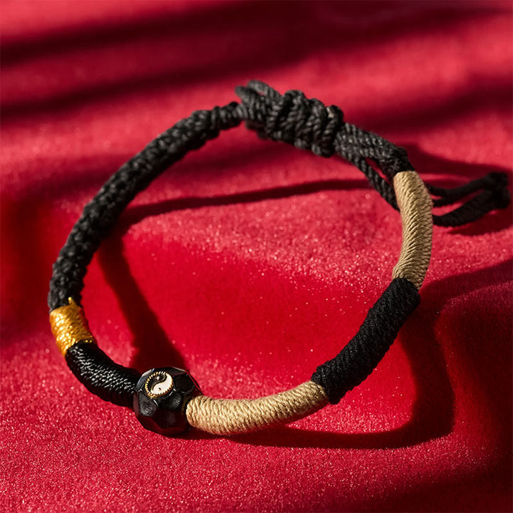 Buddha Stones Pulsera de equilibrio de hilo de ágata de fuego blanca y negra - image 1