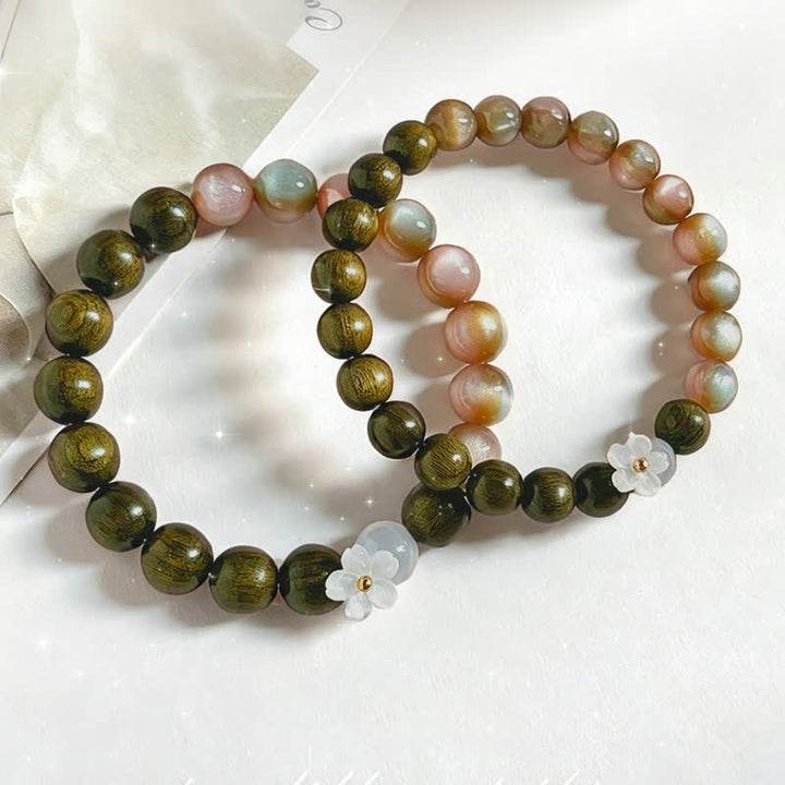 Buddha Stones Pulsera Serenity con dije de flor de ojo de gato y sándalo verde - image 11