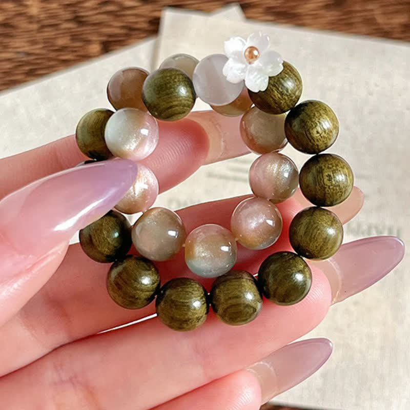 Buddha Stones Pulsera Serenity con dije de flor de ojo de gato y sándalo verde - image 9