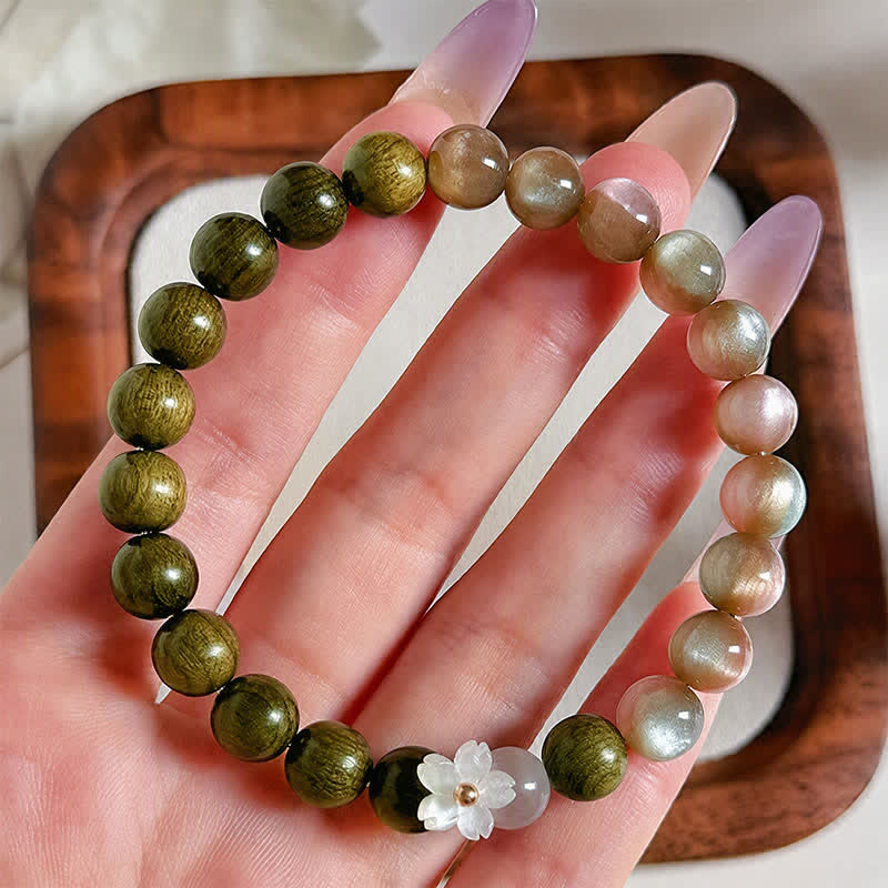 Buddha Stones Pulsera Serenity con dije de flor de ojo de gato y sándalo verde - image 3