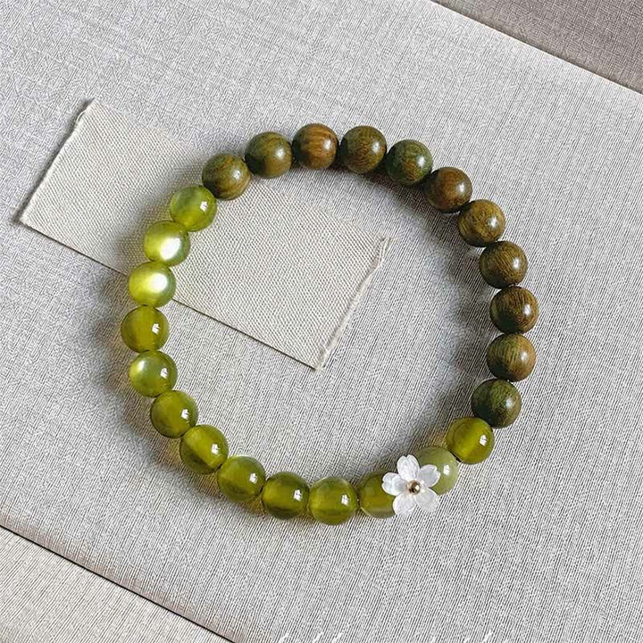 Buddha Stones Pulsera Serenity con dije de flor de ojo de gato y sándalo verde - Piedra ojo de gato de 8 mm - image 13
