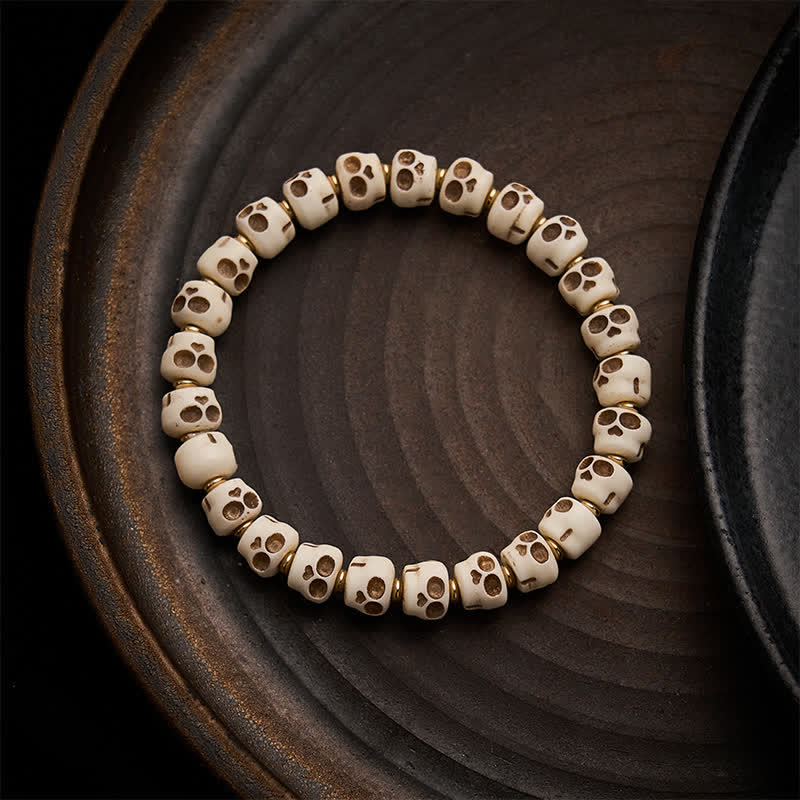 Buddha Stones Pulsera de cuentas de hueso tibetanas con diseño de calavera del Señor del Bosque de los Cadáveres para protección y coraje - 9 × 6,3 mm - image 0