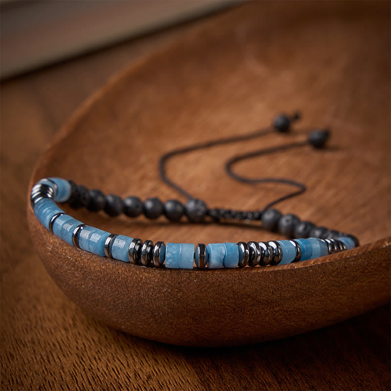 Buddha Stones Pulsera con detalles en tono plateado y claridad de roca de lava color aguamarina - image 1