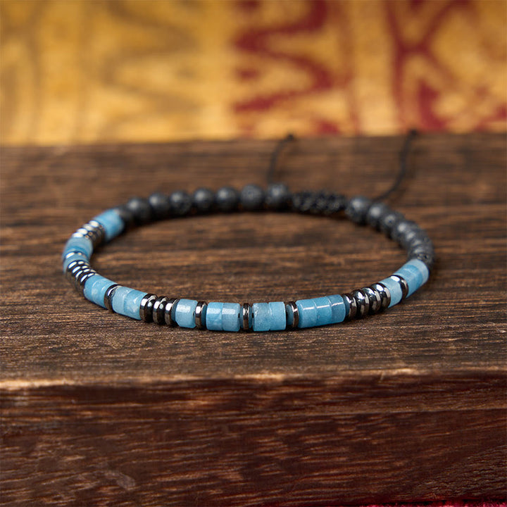 Buddha Stones Pulsera con detalles en tono plateado y claridad de roca de lava color aguamarina - image 3