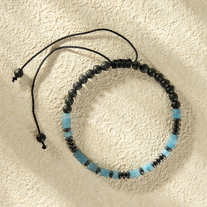 Buddha Stones Pulsera con detalles en tono plateado y claridad de roca de lava color aguamarina - image 4