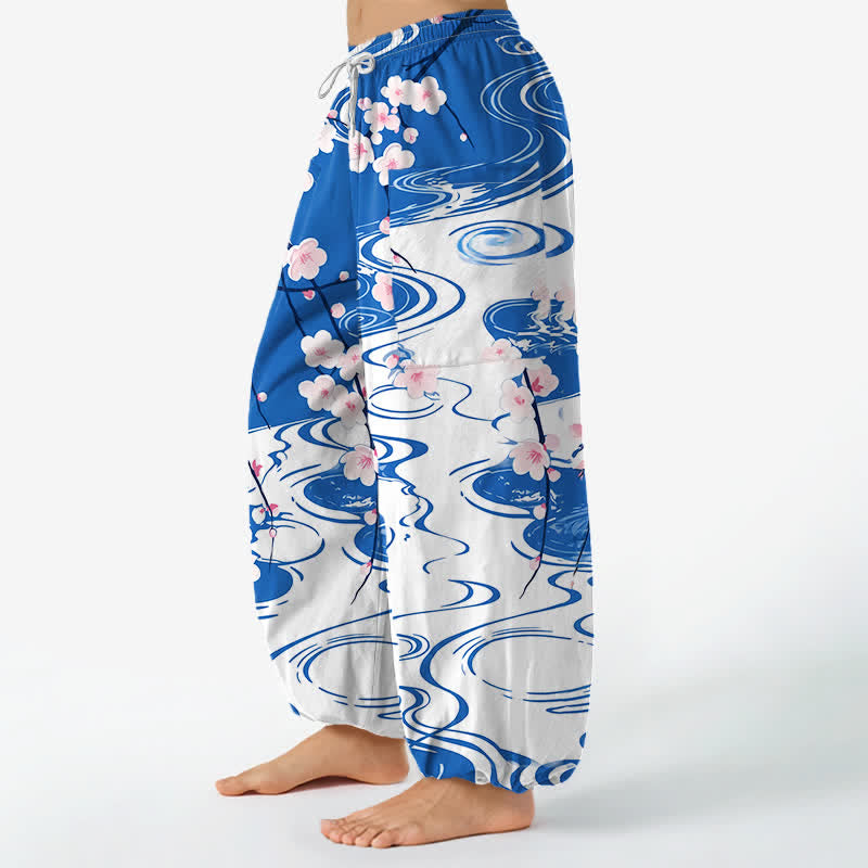 Buddha Stones Pantalones harem de mujer con cintura elástica y bolsillos laterales, estampado de flores de cerezo en algodón con efecto de ondas de agua. - image 1