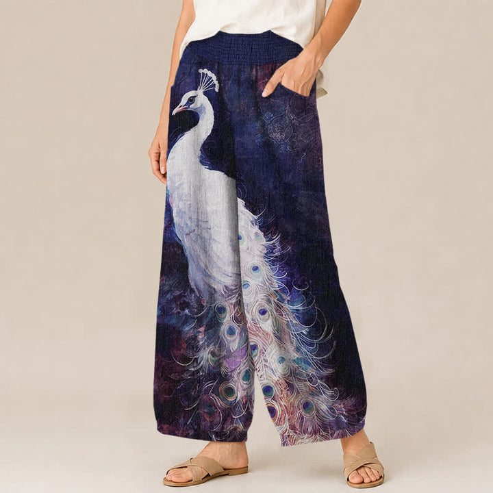 Buddha Stones Pantalones harem de mujer de algodón blanco con estampado de plumas de pavo real, cintura elástica plisada y bolsillos. - image 7
